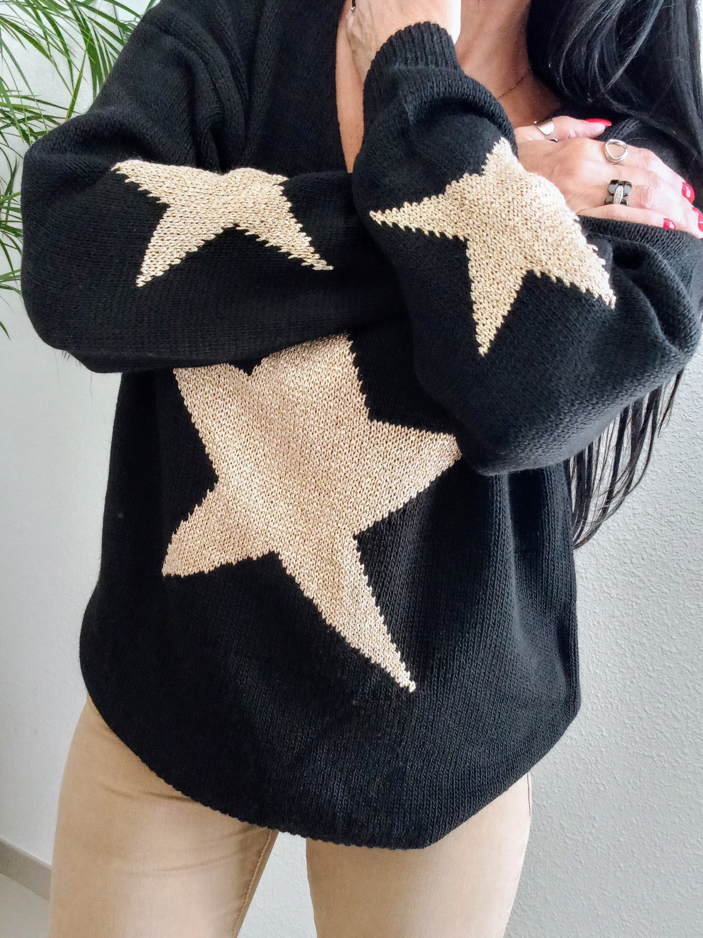 Pull noir étoile