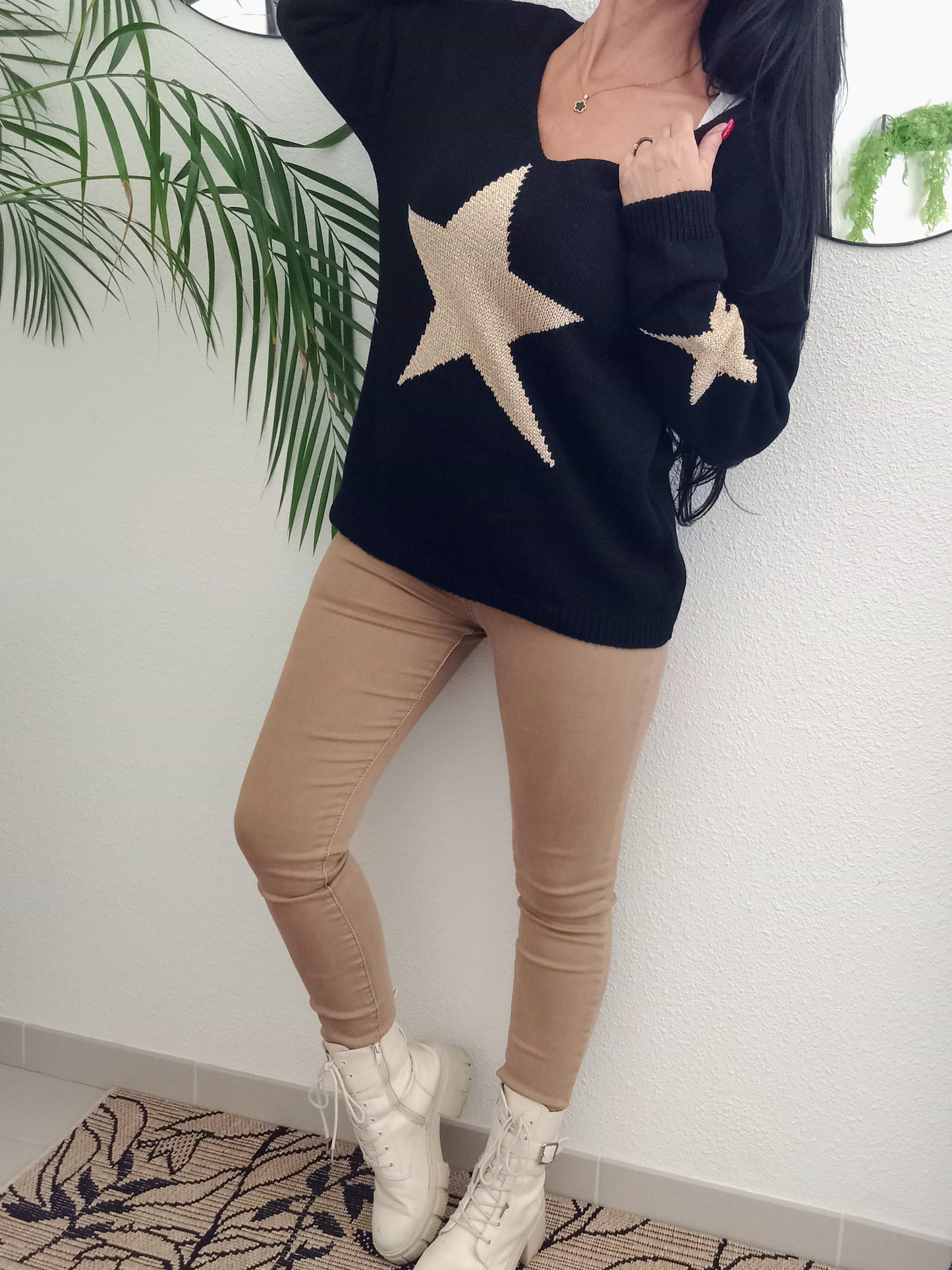 Pull noir étoile